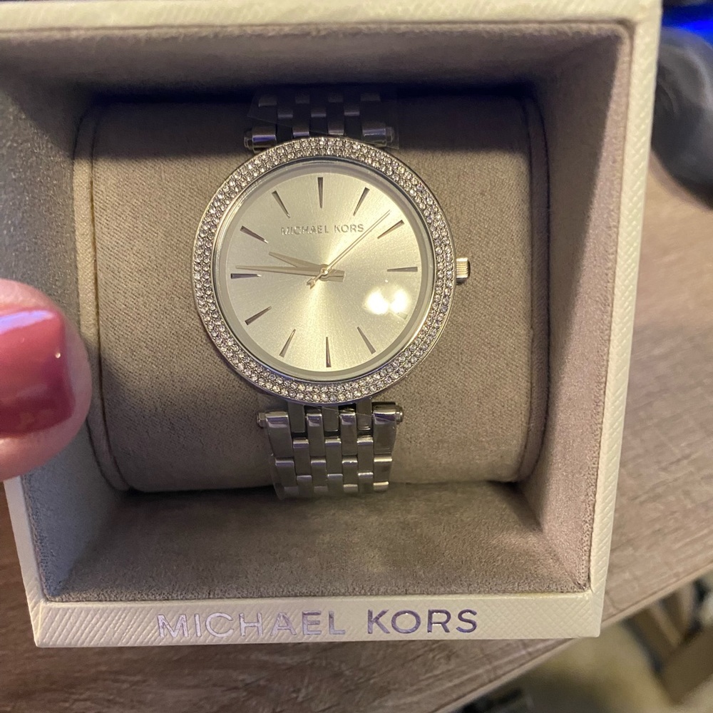 Brand new Michael Kors watch. Tags still on. Perfect gift for others or you!